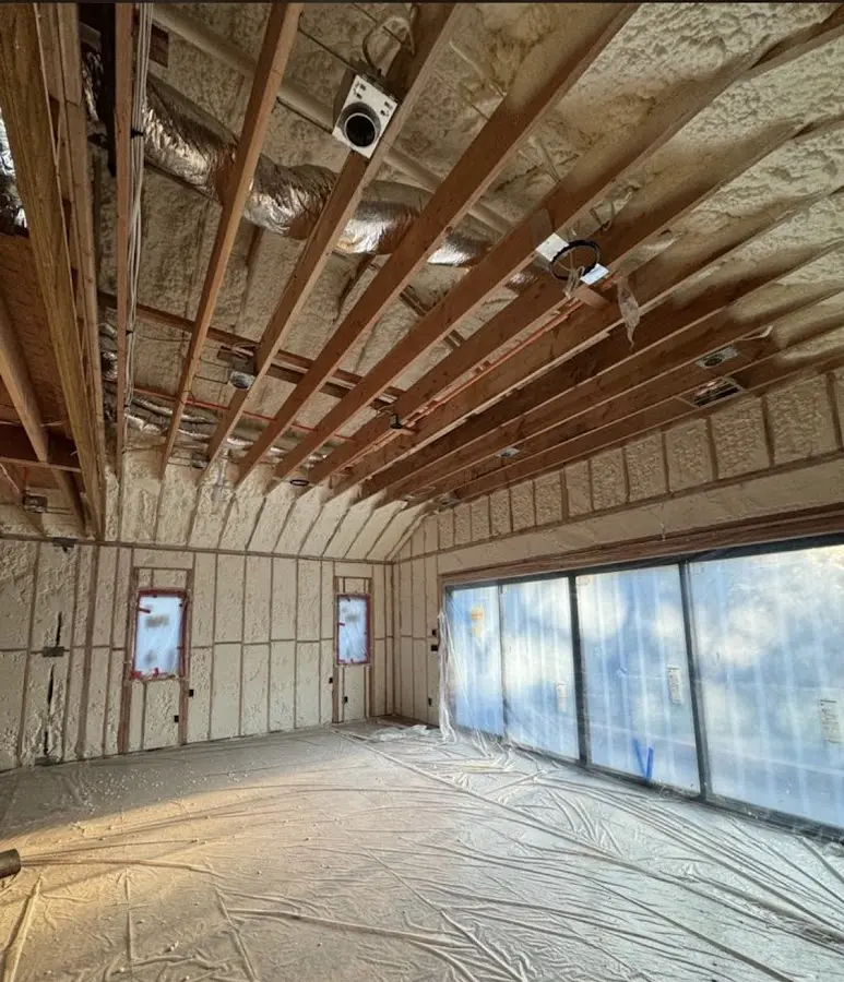Interior walls and ceiling insulated with spray foam during new construction in Oatfield